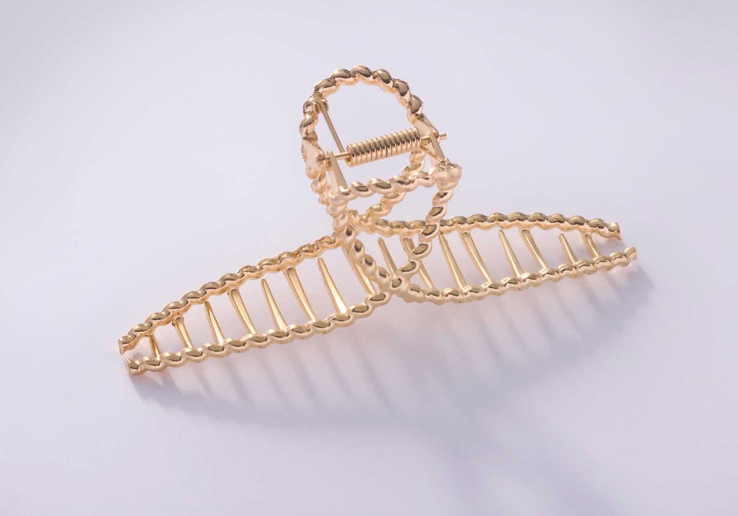 Dekorative Haarspange Gold mit geflochtenem Design